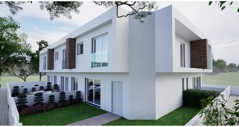 New 3 bedroom semi-detached house in Fernão Ferro on a plot of 179 m2 The villa consists of: R/C - Hall with wardrobe - Equipped kitchen (15.71m2) - Living room with fireplace (25.27m2) - Social bathroom (3.82m2) 1st Floor - Two bedrooms with wardrob...