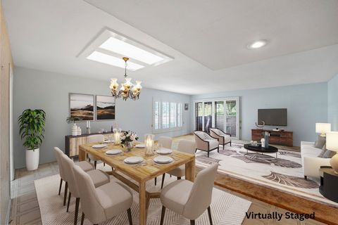 Welcome to your single story dream home in the heart of the vibrant 55+ Laguna Woods Village! From the moment you enter this enchanting end unit, you're greeted by a spacious and bright living room, complete with a large private covered patio that in...