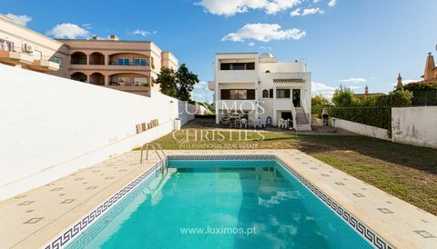 Villa with a view of the sea for sale in Quarteira, Algarve. This traditional Algarve-style home consists of two floors and a spacious basement . Two of the six bedrooms in the residence are en suite . A magnificent garden, a swimming pool, a recreat...