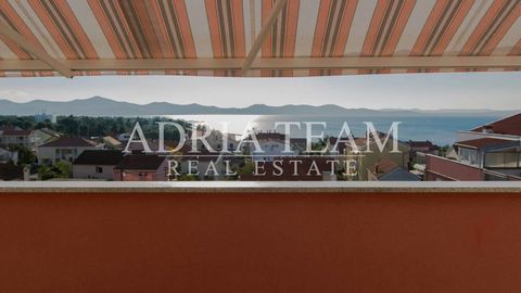 Apartment with 4 bedrooms and a beautiful sea view for sale, Zadar - Diklo PROPERTY DESCRIPTION: 4 bedrooms, living room, kitchen, dining room, 2 bathrooms, basement and parking space - 164.91 m2 + 2 terraces (70 m2) - all together 235 m2! - 350 m fr...