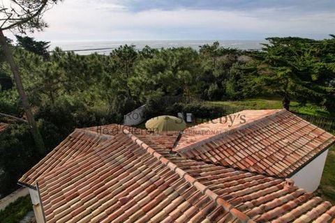 Rare opportunity at Royan Ile-d'Oléron Sotheby's International Realty: charming and unique beach house nestled on the top of the sand dune amongst the pine trees within walking distance from the Ocean and its sandy beaches. This property, of undeniab...