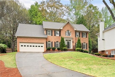 Ideally situated on a peaceful cul-de-sac within one of Alpharetta's premier neighborhoods and conveniently close to GA-400, Avalon, North Point Mall and highly regarded schools, this charming brick residence encompasses all the desirable features. B...