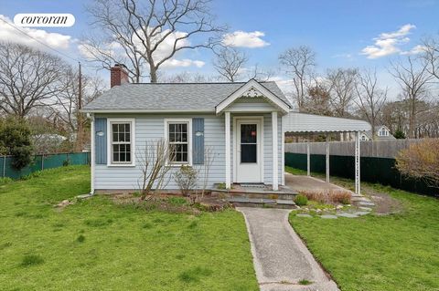 32 Evergreen offers a prime investment opportunity in Flanders just moments from the Hamptons and the North Fork. This well-maintained one bedroom, one bath cottage boasts a spacious great room with a natural gas fireplace, a kitchen with a gas range...