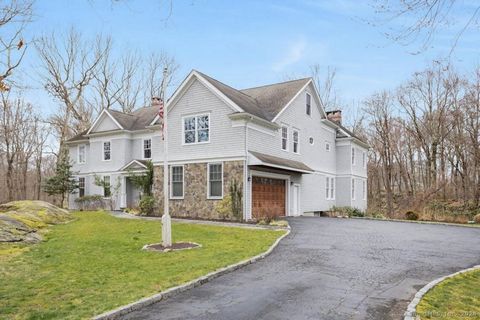 Nestled in the heart of Weston, CT, this exquisite 2013-built home sits on 3.15 wooded acres, offering privacy and tranquility in a serene cul-de-sac setting. As you step into the gracious 2-story foyer, you'll feel the perfect blend of sophisticatio...