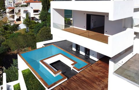 n the beautiful area of Voula, located in the Southern Suburbs of Athens and known for its squares, parks as well as its luxury hotels, and seaside restaurants, there is a modern villa of 550 sq.m. Ideal either for a private residence or for investme...