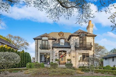 Indulge in unparalleled luxury living in Elmhurst. This custom-built masterpiece showcases exquisite craftsmanship, refined elegance, and a lifestyle of sophistication. Boasting over 7,400 square feet of meticulous design on four finished levels. Thi...