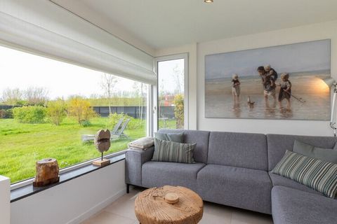 Welcome to your ideal seaside retreat in the charming coastal town of Nieuwvliet! This modern holiday home is the perfect destination for a relaxing vacation with family or friends, offering comfort, convenience, and plenty of opportunities for fun i...