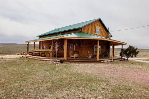 A 1700 sq. ft. log cabin featuring expert craftsmanship and sitting on approximately 4 acres, with grand vistas and part of a large pond on property-- situated on Diamond Mountain, which is about 30 minutes from Vernal, Utah. Diamond Mountain and the...