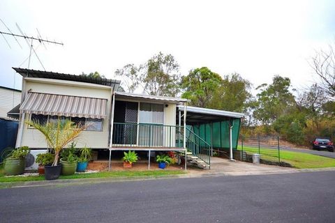 (For owner occupiers & over 50s only) This gorgeous, air conditioned transportable home with one bedroom PLUS office nook, is perfect for a couple or single who are after a little peace and quiet of an over 50s Village and only 5 minutes to Bulcock S...