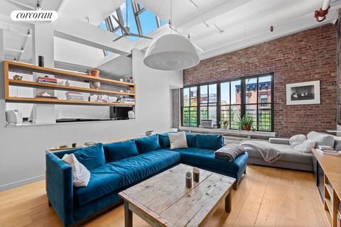 Once a factory, now a stunning two-bedroom loft... Entering the space, residents and guests are greeted by painted brick, wide-plank pine floors, and unparalleled light thanks to north facing windows and skylights. The 300+ sq/ft living room takes fu...