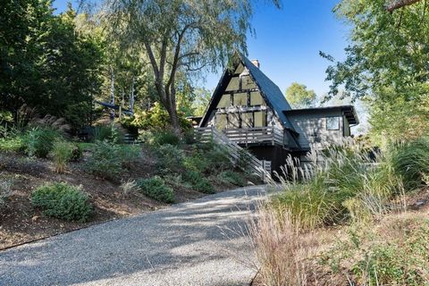 Surrounded by the natural beauty of Shelter Island, this stylishly renovated Mid-Century 'A- Frame' is now offered for sale . Located on a quiet road and blending minimalistic, well-designed interiors, with the comfort of refined designer furnishings...