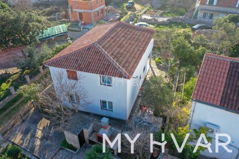 Discover tranquility in the secluded village of Rudina, just a short car ride from Stari Grad and the sea. This spacious house boasts four bedrooms, including two generously sized at 50 m² each, three toilets, a kitchen, two inviting terraces, and an...