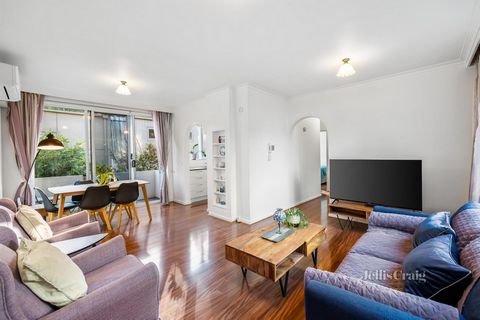 A fresh feeling to an apartment classic, this north facing two bedroom first floor security apartment is great on value. Updated with timber look floors, this solid brick gem enjoys a light filled living and dining area with sliding stacker doors to ...