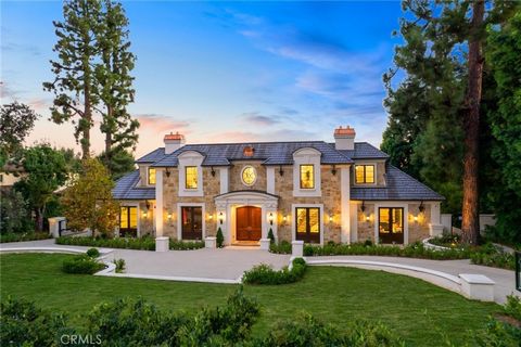Magnificent Arcadia estate in the highly sought-after Upper Rancho neighborhood designed by the reputable Robert Tong of Sanyao Intl. Newly constructed, this French Country-style mansion features 6 bedrooms, 6.5 baths, and multiple entertainment area...