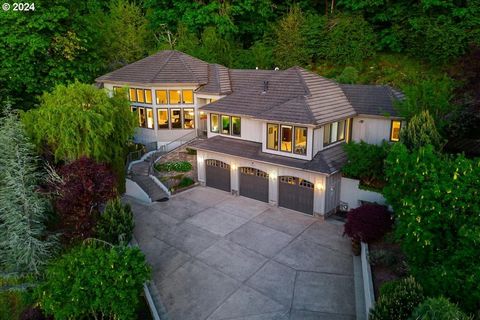 Contemporary meets Elegance with Views for days, this home is special in so many ways! This quiet & private sanctuary has been manicured to perfection. As you approach up the private driveway, the Board & Batten siding, architectural design, elevated...