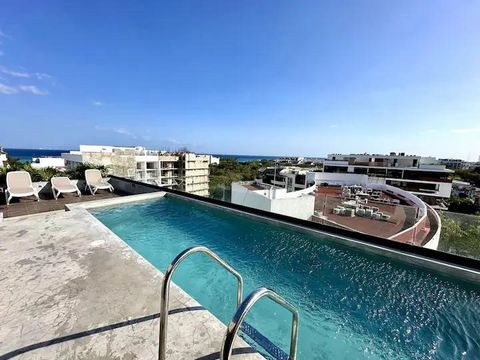 Geweldig appartement met 2 slaapkamers in Playa del Carmen op slechts 1 blok van het strand, aan Fifth Avenue, uitstekend geschikt als tweede huis of als bedrijf om te huren, met een dak met uitzicht op de oceaan en 24/7 beveiliging
