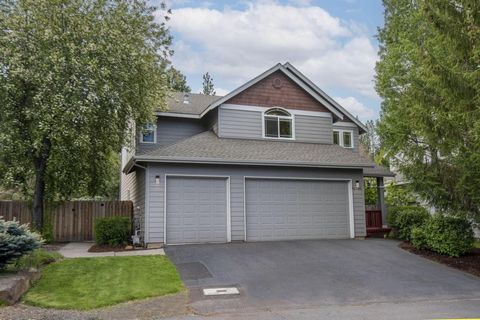 Outstanding home in great west side Bend neighborhood. Close to all Bend has to offer but tucked in the tall timber with access to private trails and the river all out your backyard gate. Beautifully designed with an open floor plan that boasts 19-fo...