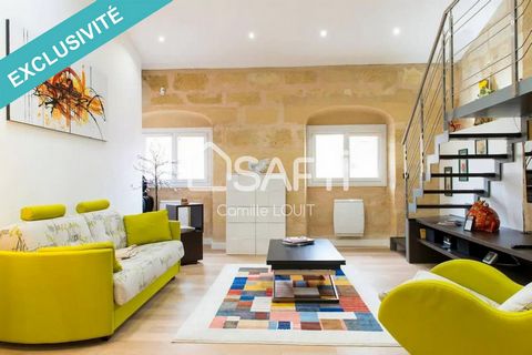 Located in Bordeaux (33000), this 90 m² apartment is a true gem nestled in the heart of the golden triangle, the most prestigious district of the city. Benefiting from an exceptional location in a quiet, pedestrian street, it offers an ideal living e...