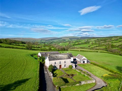 Nestled in a secluded yet convenient location, this 13-acre country estate offers a haven of tranquility. At its heart lies a spacious period family home boasting six bedrooms, complemented by a collection of charming stone barns and modern structure...