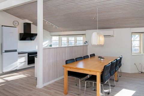 A unique holiday cottage with a whirlpool that fits 6 people and a sauna. The interior is bright and modern and nicely furnished. The house is located on a plot close to the water. You can enjoy the view of Vejle Fjord from the living room, kitchen a...