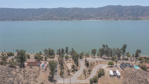 Vacant lot with BEAUTIFUL panoramic views of the lake, mountains, city lights. SO private and peaceful. Ready to build-- water meter and electricity on site. Bushman Avenue is located right off of Lakeshore Drive- directly across the street from the ...