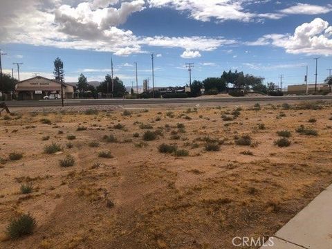 Prime location!! Commercial zoned land at the corner of Highway 18 and Headquarter Rd. read for the new owner to open his business.