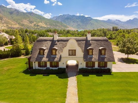 An architectural treasure nestled on two flat acres with awesome mountain views that are truly breathtaking. This double gated community is nestled in the heart of the Cottonwood Estate district with country charm, peace and quiet and beauty all arou...