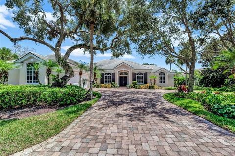 Classically designed 3BR/3.5BA split plan pool home with office/den. Private lakefront view. Beautifully decorated. Impact windows, CBS construction. Open floor plan with high ceilings. Formal living with tray ceilings, gas fireplace & built-ins. Pri...
