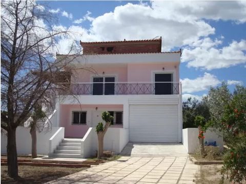 Apartment house for sale in Ermioni, Argolis. The house of 214.69 sq.m. (2 floors + roof) on the main roundabout, Ermionis-Didymon provincial road. Ground floor apartment: 84, 50 sq.m., 2 bedrooms, 1 bathroom, 1 wc, 1 open kitchen, living room, dinin...