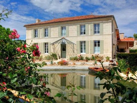 , Property with mansion, reception room, 17th century water mill, 2 tourist cottages on 2 Hectares . Close to Jonzac only 30 minutes from Cognac and 1h from Bordeaux, in a bucolic setting, “Domaine” offering 700 m² of living space. The property is co...