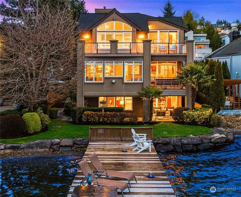 Nestled between Carillon Pt and downtown Kirkland, this property boasts 50' of private waterfront and 241-ft dock with 2 lifts, making it a haven for aquatic enthusiasts. Main living spaces have a wonderful flow from kitchen to dining and living, wit...