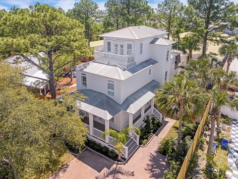 Welcome to your Coastal Sanctuary! This luxurious beach town abode offers unparalleled elegance and comfort. Completely renovated in 2023, step inside to discover crafted Ash hardwood floors throughout that exude sophistication, complimented by shipl...