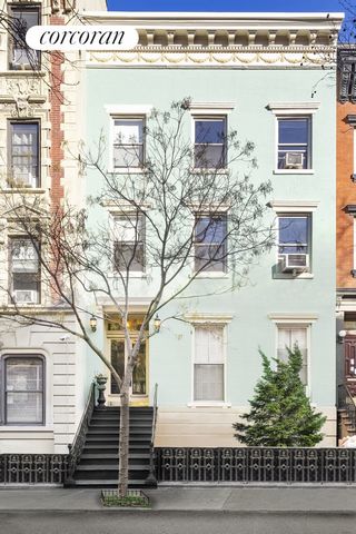 Welcome to a One of One opportunity to own a 25 foot wide, unique, four family, landmarked prewar townhouse on one of the most beautiful blocks in all of Chelsea. Owned by the same family for over 50 years, this stunning home is replete with original...