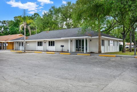 Announcing a prime commercial real estate opportunity in Tampa: a strategically positioned corner lot boasting a multitude of parking spaces and unparalleled visibility. This meticulously renovated property, formerly housing a dental office, retains ...