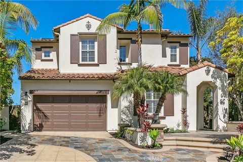 Welcome to your dream home nestled in the prestigious gated Vittoria community in Talega. Center of a tranquil cul-de-sac, boasting stunning vistas of the golf course and a peek-a-boo view of the ocean incredible evening sunsets. This spacious 5-bedr...