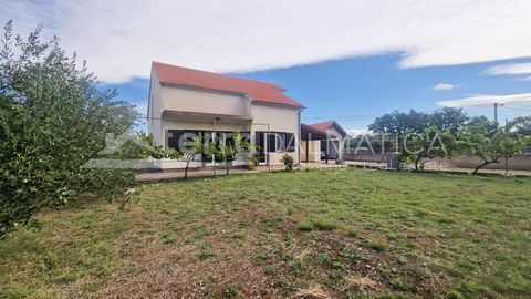 In the surroundings of Sibenik, a single-storey house with a spacious yard is for sale, not far from Krka National Park. Located in a quiet area, yet only a 10-minute drive from the center of Sibenik, the highway and Krka National Park, this property...