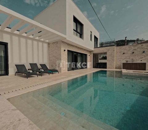 Luxury House with Pool Close to the Beach in Sarıgerme, Muğla Dalaman and Ortaca are the fastest developing districts of Muğla, thanks to the influence of the airport. The region has a peaceful living environment with its long sandy beaches, carefull...