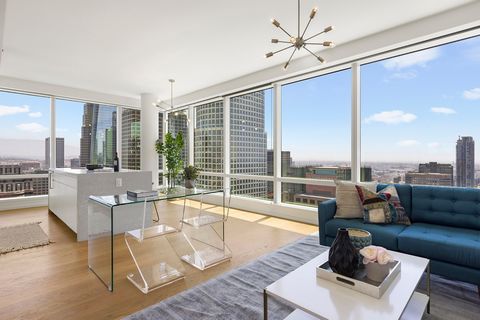 Experience luxury high-rise living at its finest in this stunning 2 bed/2 bath corner residence. From this 41 st-floor unit, you can see as far as the LA harbor, the famous Hollywood sign and the San Gabriel Mountains with incredible scenes both day ...