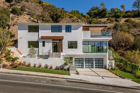 New construction, this elegant modern designed spacious home with; 4,100 square feet of living space on an over 25,0000-square-foot lot. Features are 5 bedrooms, 6.5 baths with living room, dining room, office, gym-theater or bar, infinity pool, and ...