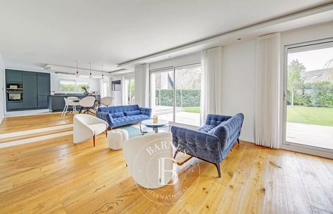 Barnes Versailles is listing a 224m² (2,411 sq ft) house in Chavenay, set on a 900m² (9,688 sq ft) plot. This property, recently renovated with high-quality materials, offers excellent thermal insulation. Its vast, light-filled living room with large...