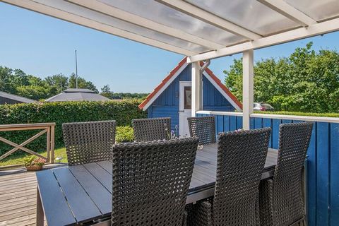Holiday home located with a view to the sea at Juelsminde. With only about 300 meters to a nice and child-friendly beach and large playground, the area is ideal for families with children. In this bright and modernized cottage you can on the cool day...