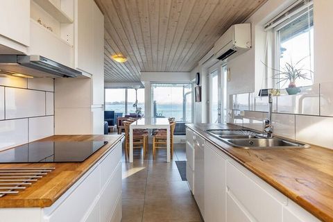 If you want to spend your holiday in 1st row to the ocean this holiday cottage with whirlpool is the obvious choice. 2 storeys with great views of the Little Belt from both house and terrace. Combined kitchen and living room with ocean view. There is...