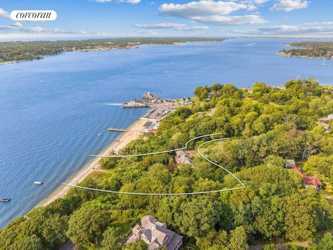 Shelter Island Heights Waterfront Property, this contemporary 3-bedroom home with stunning sunset and water views, perched above trees, is fantastic place for someone looking for a serene and picturesque setting. Decks surrounding the living areas pr...
