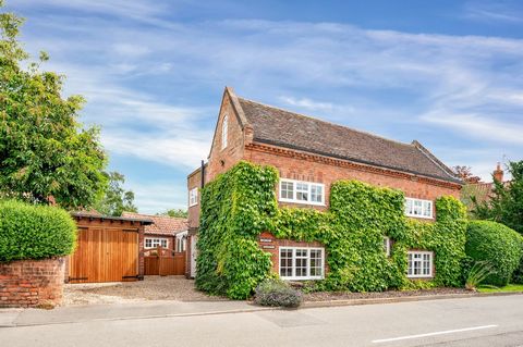 Dating back to 1650, this charming 4 bedroomed characterful cottage is located in a highly convenient and picturesque village, extending to 2433 sq.ft. The ground floor enjoys a large entrance porch, guest cloakroom/shower, inner hallway, 3 reception...