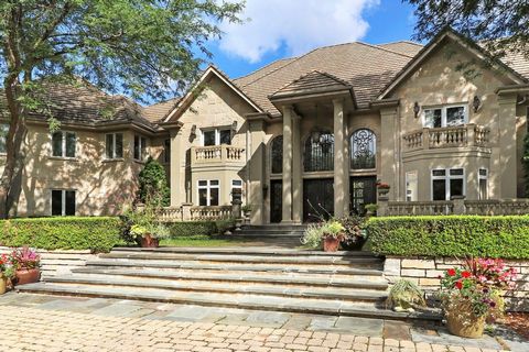 You'll feel like you're stepping into a grand Tuscan Villa when entering this absolutely breathtaking, masterfully designed massive estate that exudes Old World style elegance. This truly unique property is nestled on 3 acres of landscaping that seam...