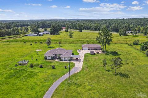 ** Open House this Saturday, September 2nd from 11-1 pm** This private and secluded Ranch home on 22 meticulously cleared acres is thoughtfully designed for both agriculture and comfortable living. Nestled within this expansive haven is also a 1,920-...