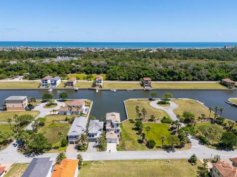 This magnificent waterfront new construction luxury home is a Boater's Paradise and ready for its new owners! Nestled in the prestigious Yacht Harbor, a 24-hour gated community in Palm Coast, this residence offers direct access to the Intracoastal Wa...