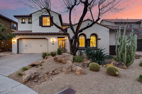 THE ULTIMATE LIFESTYLE in coveted Fireside at Desert Ridge! SPACIOUSNESS and IMPECCABLE DESIGN define this home w/ soaring ceilings, a grand staircase, large great room, spacious bedrooms, walk-in closets, 2 Flex rooms and ABUNDANT STORAGE! The CHEF'...