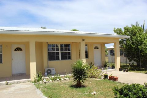 Take advantage of this great opportunity to own a steady income generating property in the desirable community of Palm Grove, Grand Turk. This very well-maintained triplex apartment building comprises three 2-Bedroom, 1-Bathroom units just a short di...