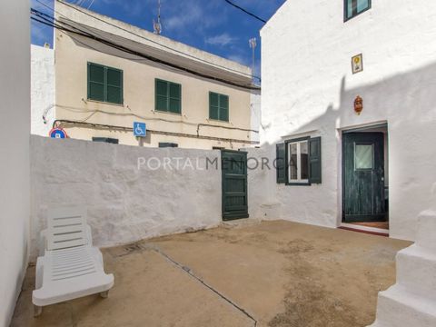 A unique house with patio for sale in the town of Sant Lluís! Discover this wonderful traditional house with a lot of character located in the middle of the village. The property has 135 m² divided between a ground floor with two bedrooms, a bathroom...